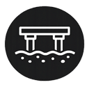 Bridge icon over water on black circle background.