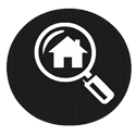 Magnifying glass over house icon